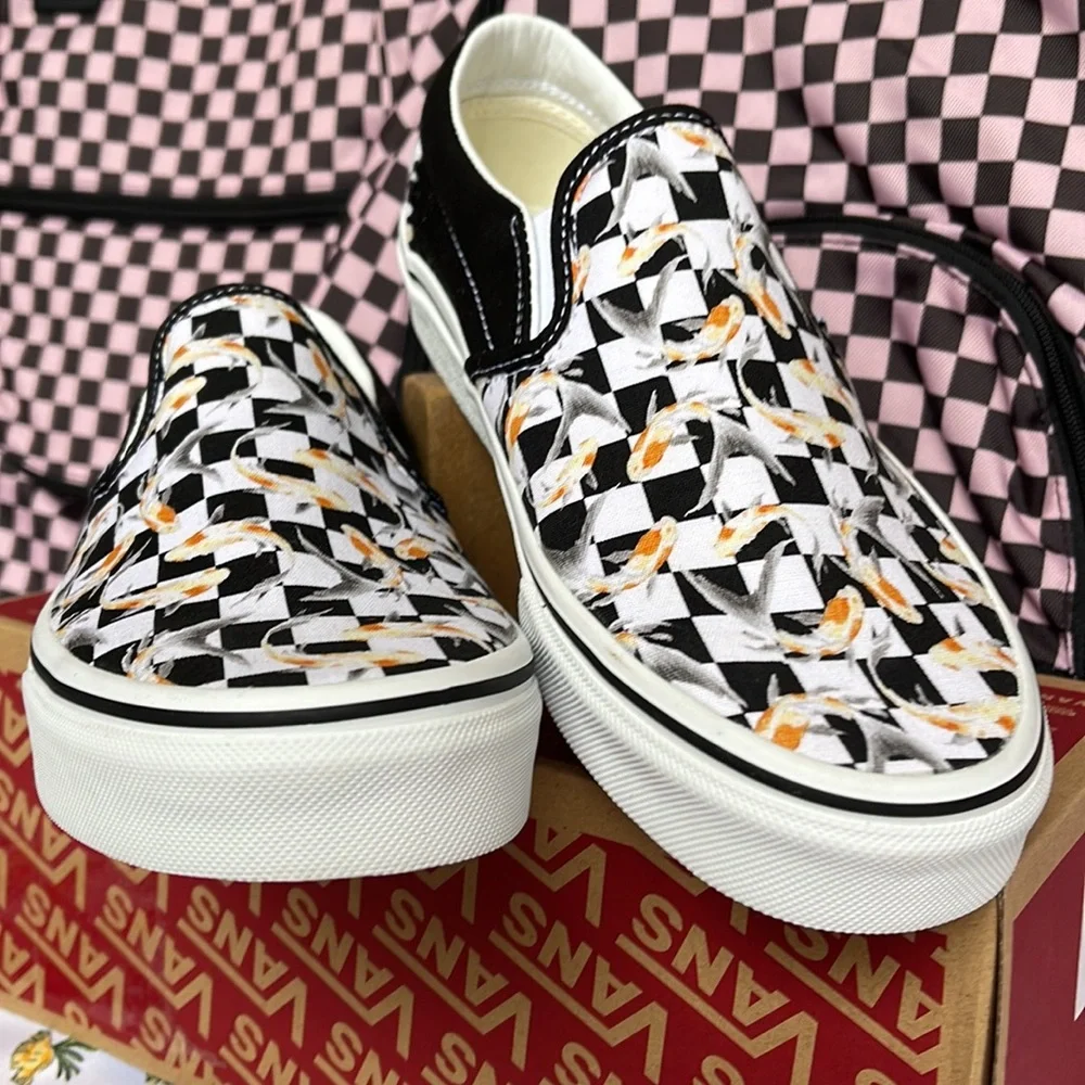 Vans WMNS Classic Slip-0n
Checkerboard Koi/Black
VN0A5JMHVG3
Sneakers - Picture 8 of 16
